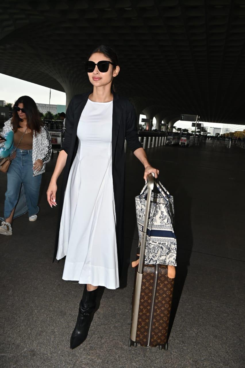 Mouni Roy was spotted at the airport jetting off for a getaway with a friend.